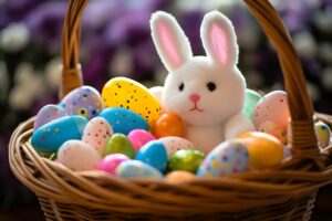 Easter basket filled with colorful eggs and a cute white bunny.